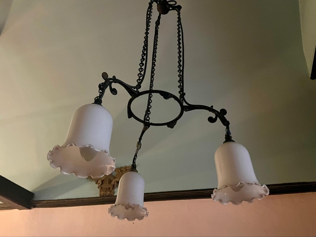 Oil lamp converted to electric using the same bracket as shown in VCH